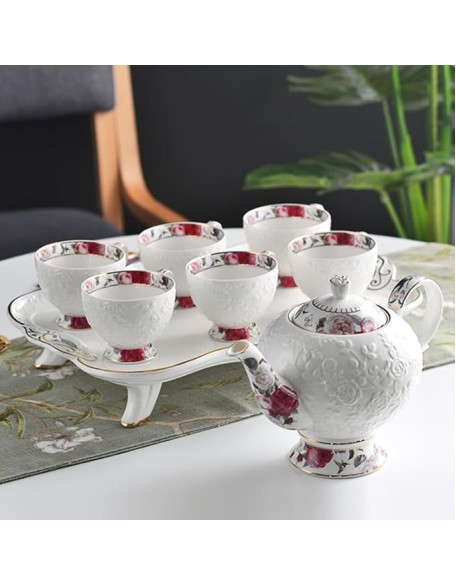Elegant White Porcelain Tea Set with Gold - trimmed Detailing and Floral Embossment, 1 Teapot and 6 Cups, Ideal for Refined Afternoon Tea